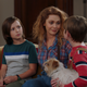 Wanda, her sons, and their dog, Sparky.